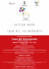 Locandina evento con piccola casa disegnata. loghi associazioni volontariato e programma delle due giornate