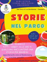 locandina colorata  con fotografia del frigo book-crossing nel parco di Casumaro